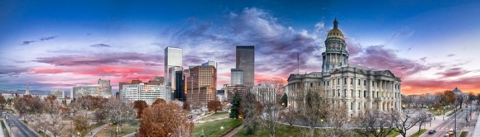 A new political day dawns in Denver